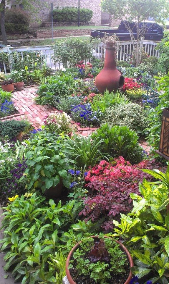 Vibrant residential garden with decorative urn